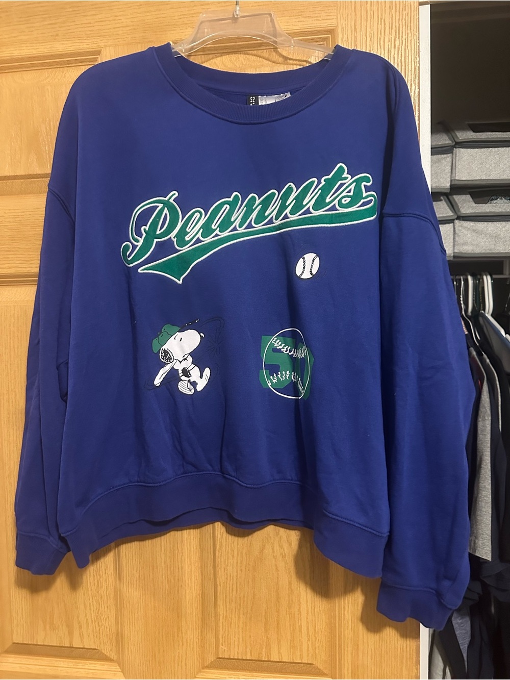 Peanuts Women's Royal Blue Crewneck Sweatshirt with Green Script
